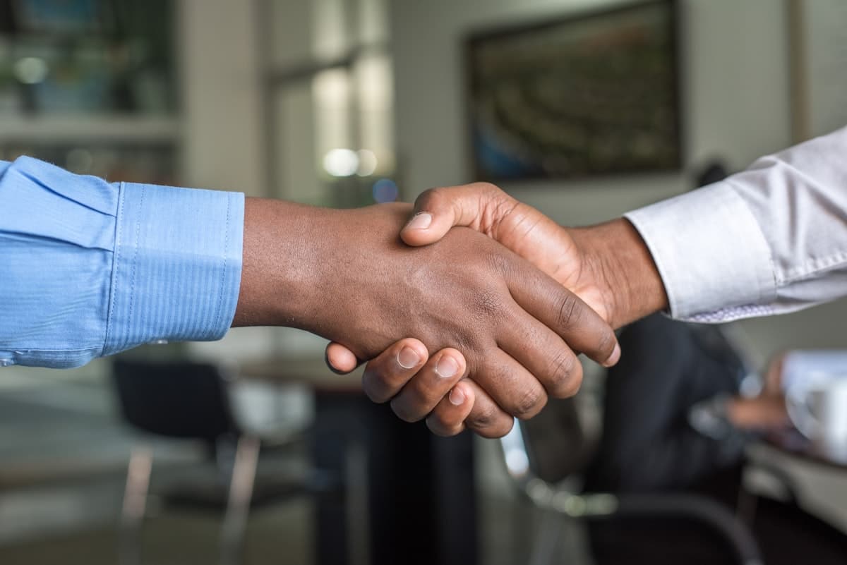 Professional business handshake — partnership and trust